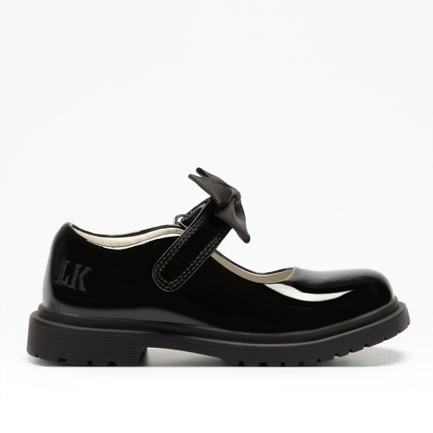 A girls chunky Mary Jane school shoe by Lelli Kelly, style LK8661 Maisie, in black patent leather with velcro fastening and detachable black fabric bow. Right side view.