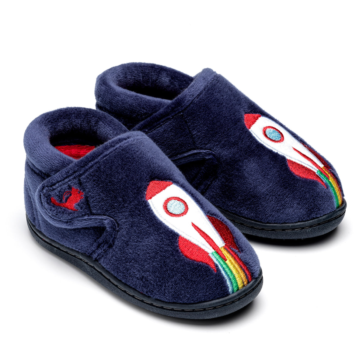 A pair of boys slippers by Chipmunks, style Blast, in navy multi with rocket design and velcro fastening. Angled view of right side.
