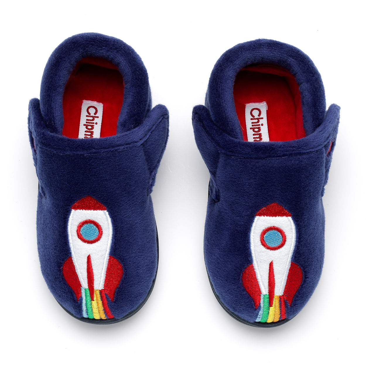 A pair of boys slippers by Chipmunks, style Blast, in navy multi with rocket design and velcro fastening. View from above.