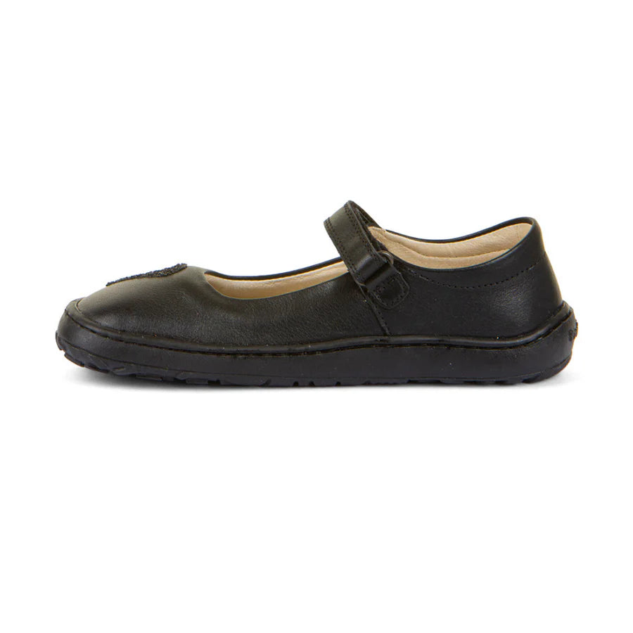 A girls Mary Jane  school shoe by Froddo, style Nina H 3140191, in black leather with glitter heart to front upper and velcro fastening. Left side view.