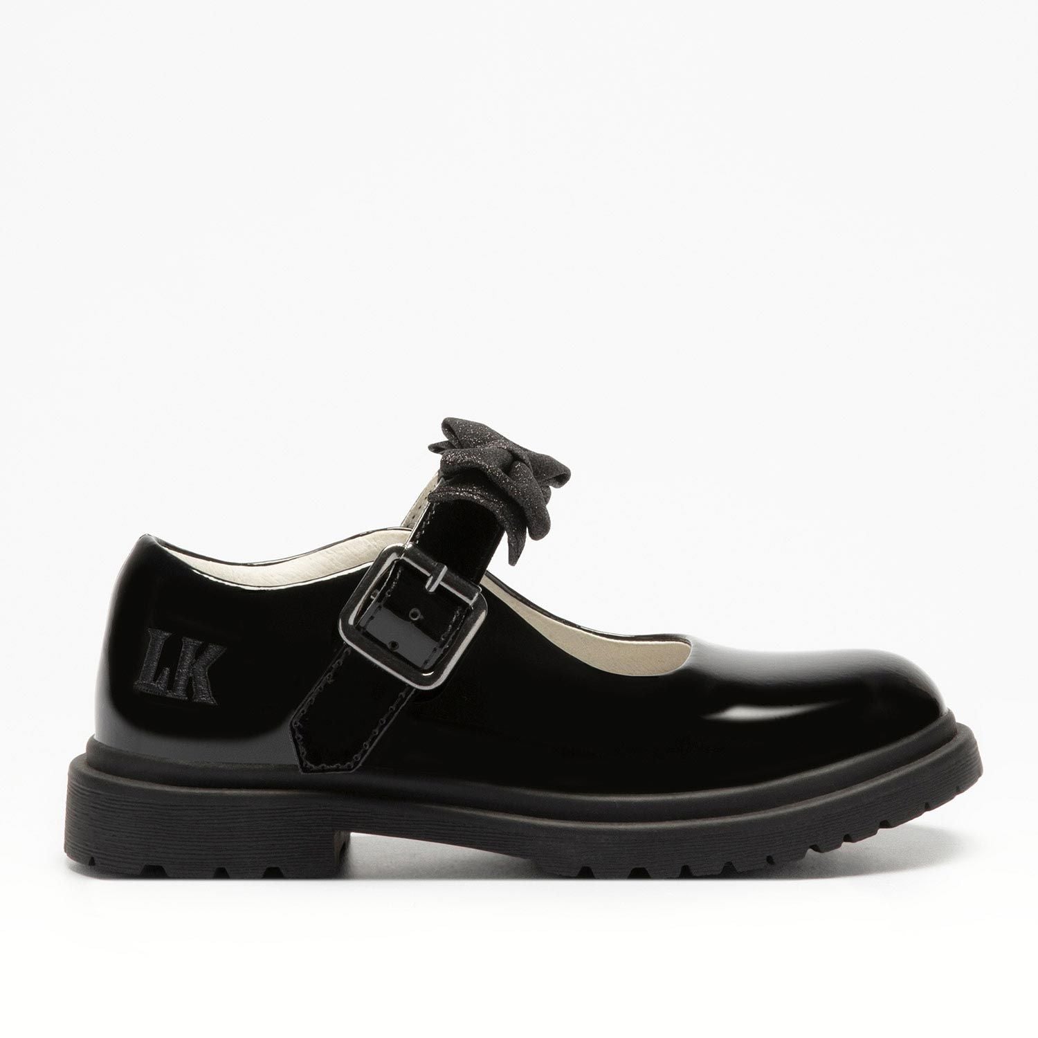 A girls chunky Mary Jane school shoe by Lelli Kelly, style LK8359 Mollie, in black patent leather with buckle fastening and detachable fabric bow. Right side view.