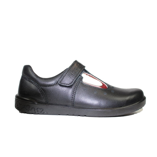 A girls t-bar school shoe by Ricosta, style Scarlett in black with velcro strap and star pattern on the front. Right side view