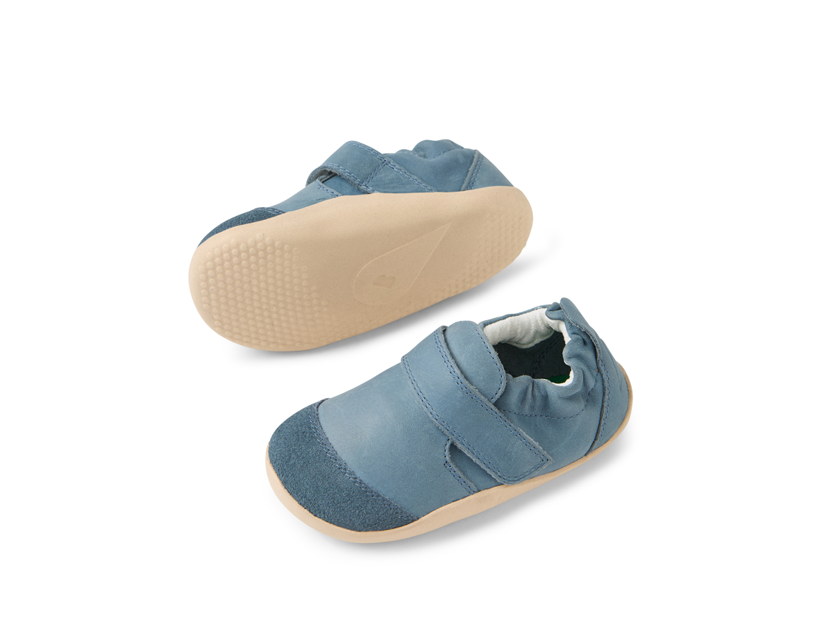 A pair of unisex pre walkers by Bobux ,style Marvel XP, in blue with velcro fastening. View from above showing sole and top of shoe.