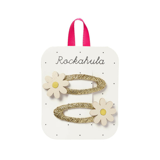 Sparkly gold hair clips with daisy designs by Rockahula on branded card