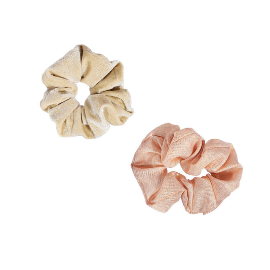 One beige and one pink scrunchie by Rockahula shown side by side.