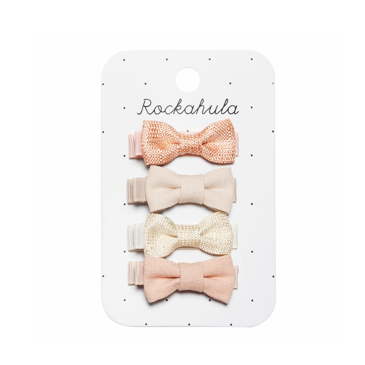 Set of four pink bow hair clips by Rockahula on a branded card.