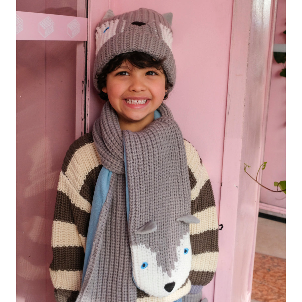 Grey knit hat with husky face design by Rockahula worn by child, front view