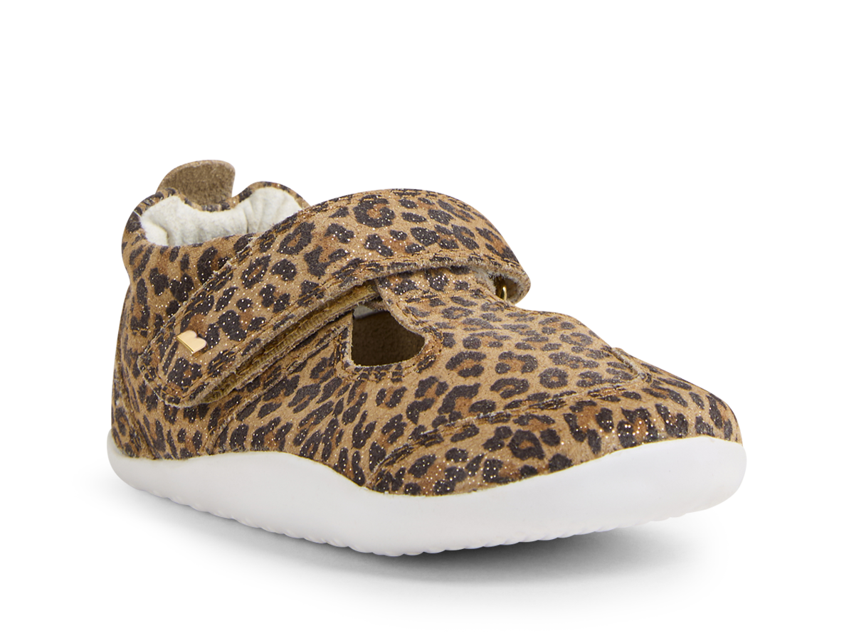 A girls T-Bar pre walker by Bobux, style XP Scout, in brown leopard print with velcro fastening. Angled right side view.