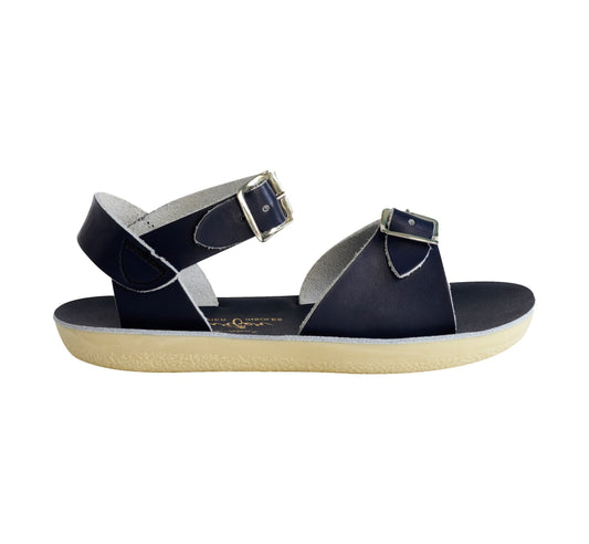 A unisex sandal by Salt Water Sandals in navy with double buckle fastening across the instep and around the ankle. Open Toe and Sling-back. Right Side view.