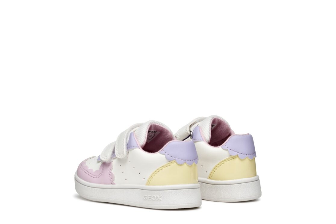A girls casual shoe by Geox, style B Eclyper in white / light yellow, with double velcro straps. Rear angled view of a pair.