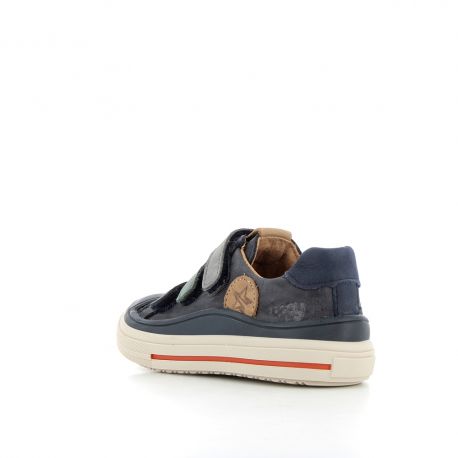 A boys casual trainer by Bopy, style Viggo, in blue leather. three Velcro fastening. Left side back angled view.