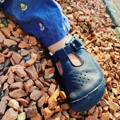 Child wearing start-rite shoes-baby-jack in navy leather boys-t-bar buckle pre-walkers