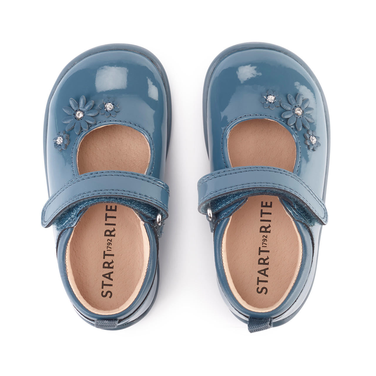 A pair of girls Mary Jane shoes by Start Rite, style Fairy Tale, in pale blue patent with velcro fastening. Above view.