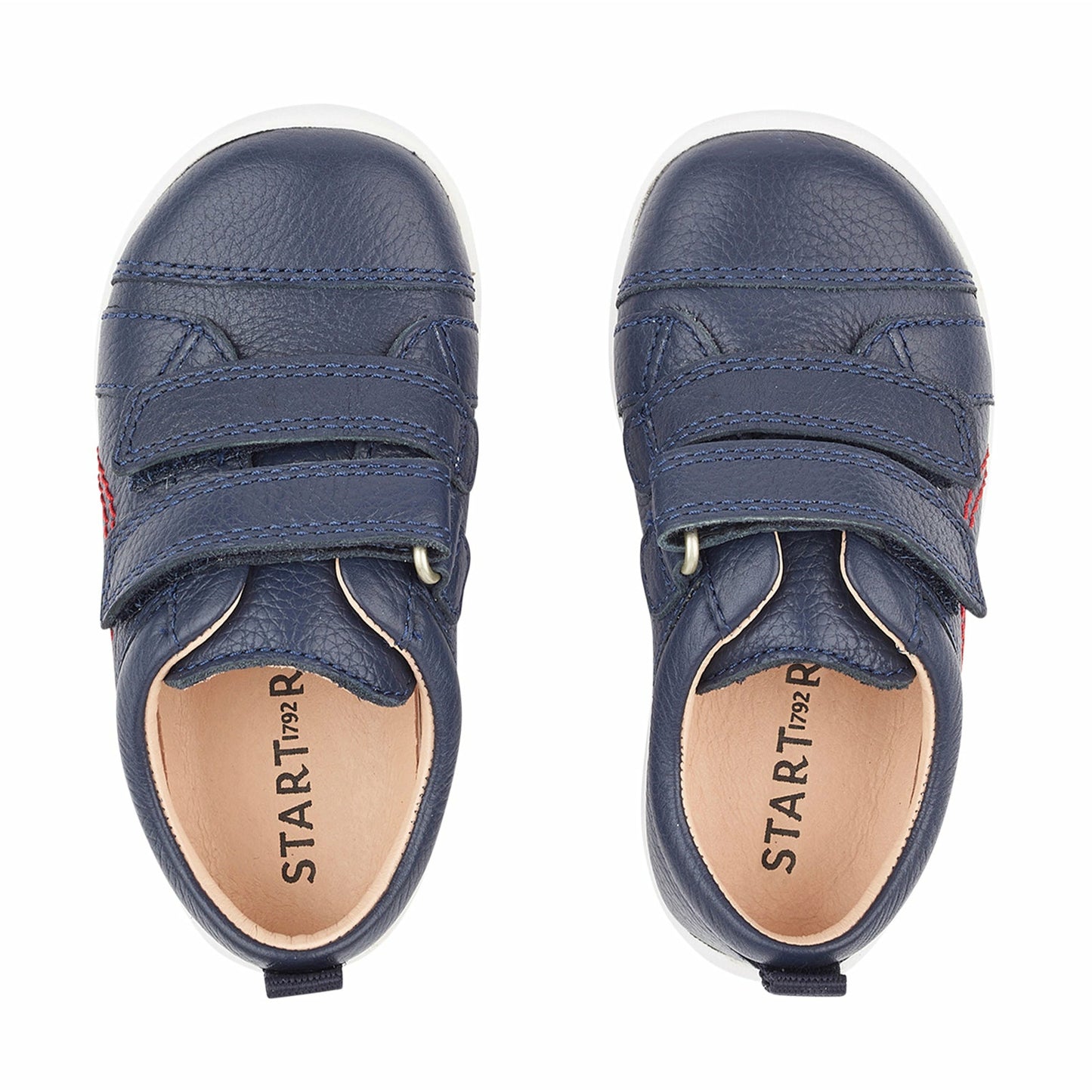 A pair of boys casual shoes by Start Rite,style Tree House, in Navy leather with double velcro fastening. Top view.