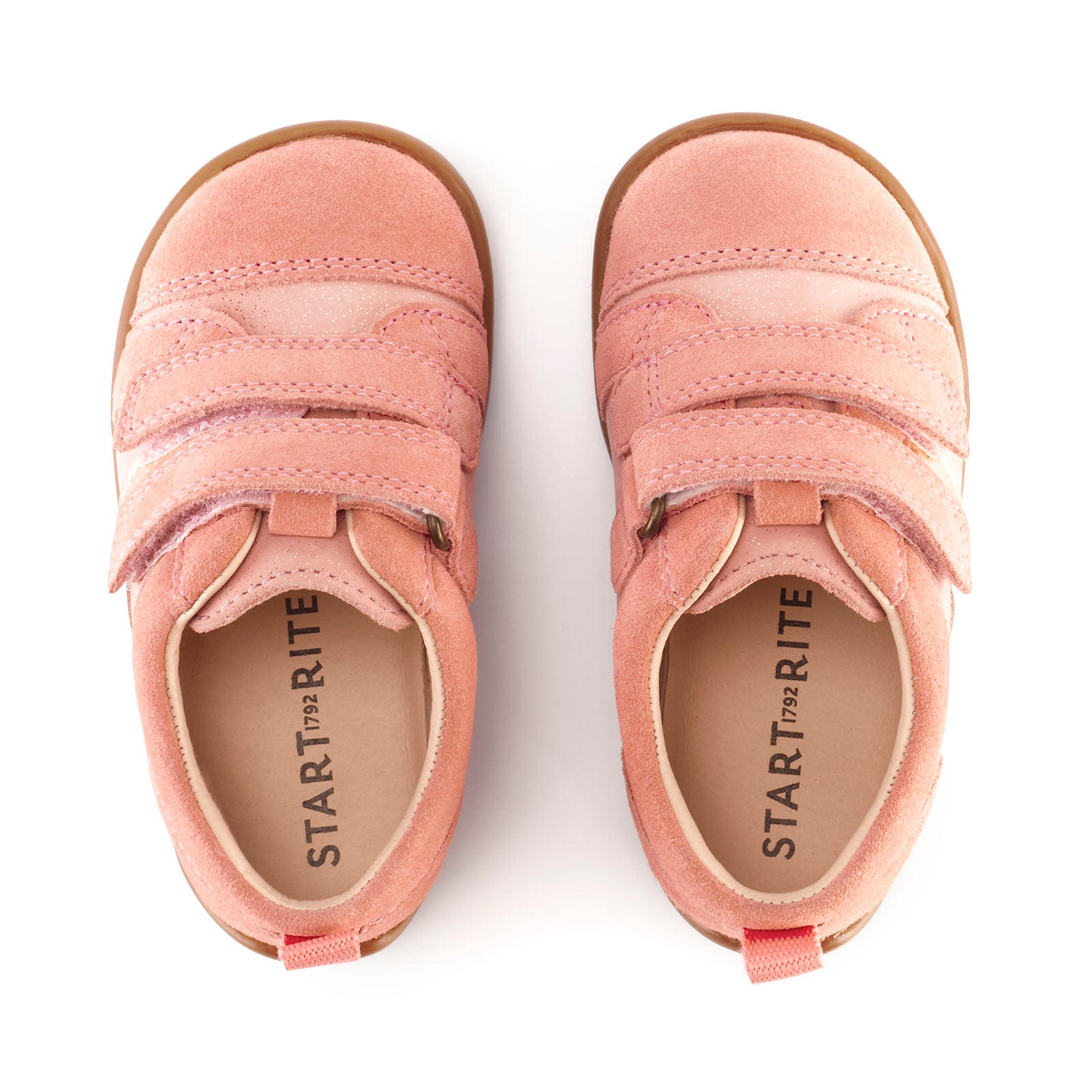 A pair of girls casual shoes by Start Rite, style Maze, in pink and gold with double velcro fastening. Above view.