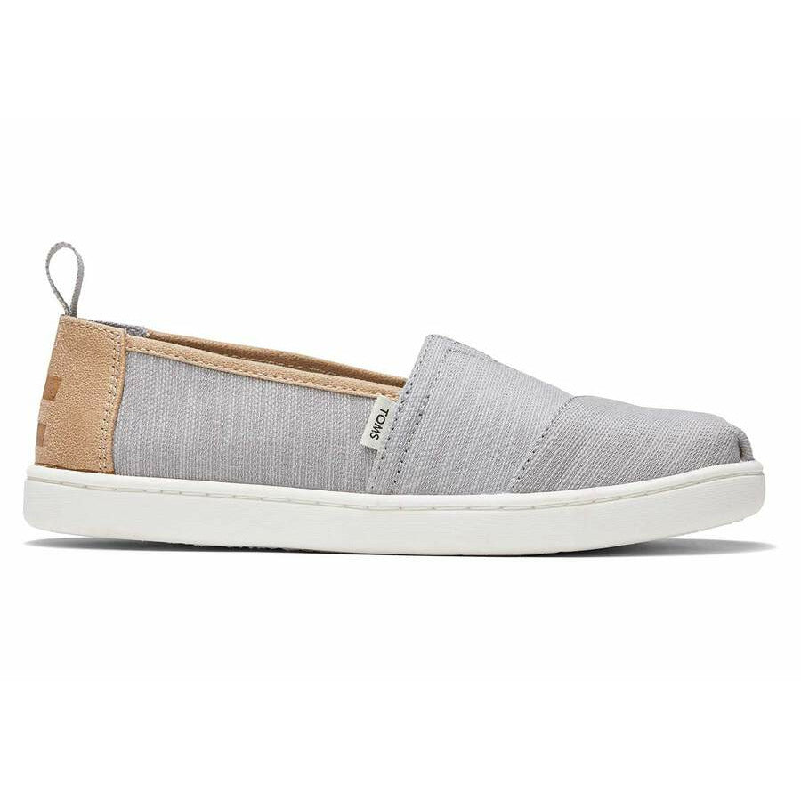 A unisex canvas shoe by TOMS, style Alpargata, a slip on in Grey and Tan. Right side view.