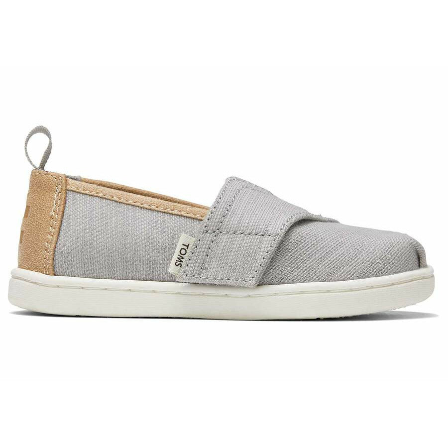 A unisex canvas shoe by TOMS, style Alpargata, in Drizzle Grey and Tan with a velcro strap. Right side view.