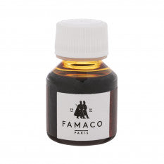 A bottle of black shoe dye by Famaco. Front view.