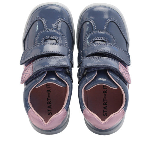 A pair of girls casual shoes by Start Rite, style Seesaw, in blue and purple patent leather with double velcro fastening. Above view.