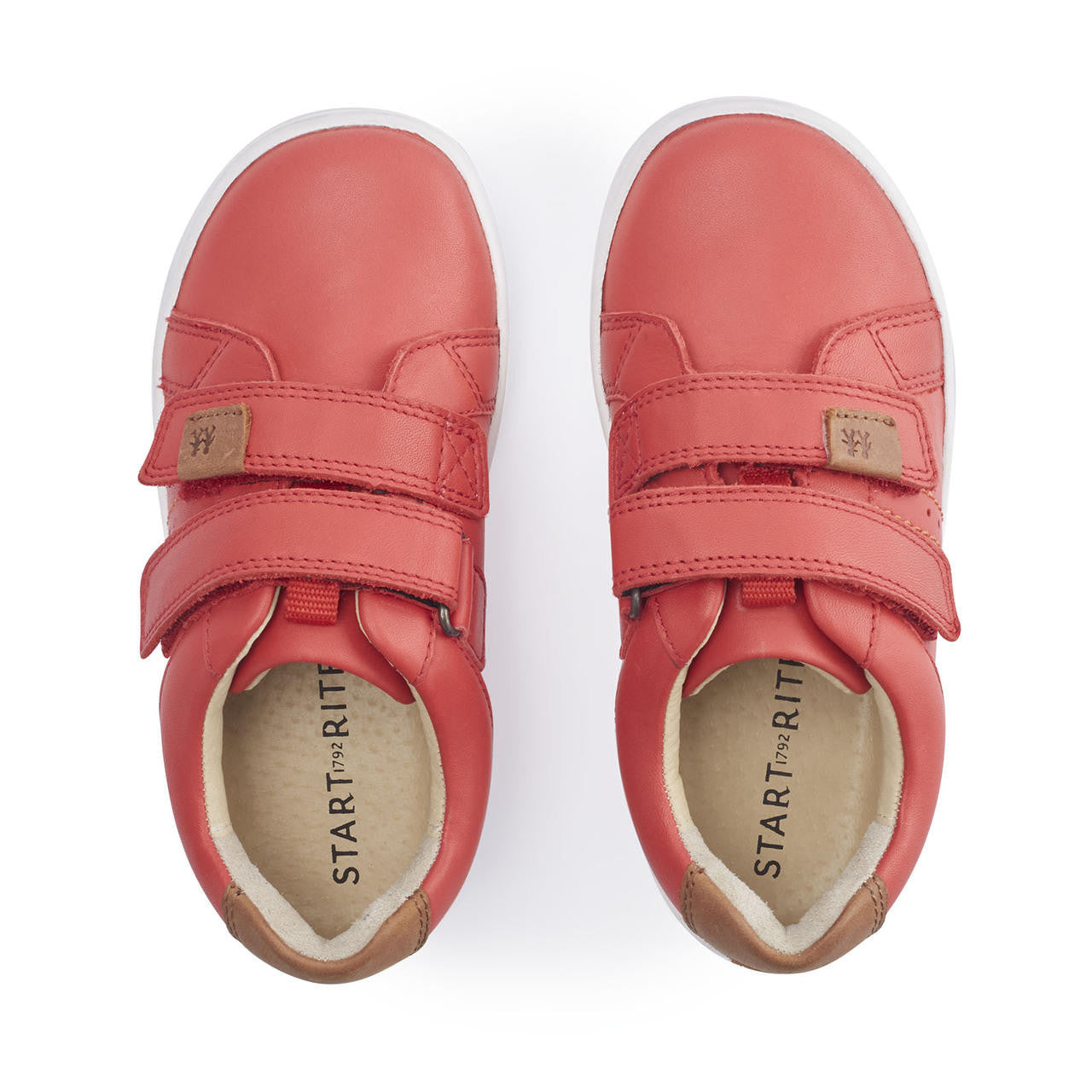 A pair of boys casual shoes by Start Rite, style Explore, in red leather with double velcro fastening. Top view.