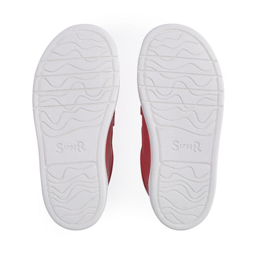 A pair of boys casual shoes by Start Rite, style Explore, in red leather with double velcro fastening. Sole view.