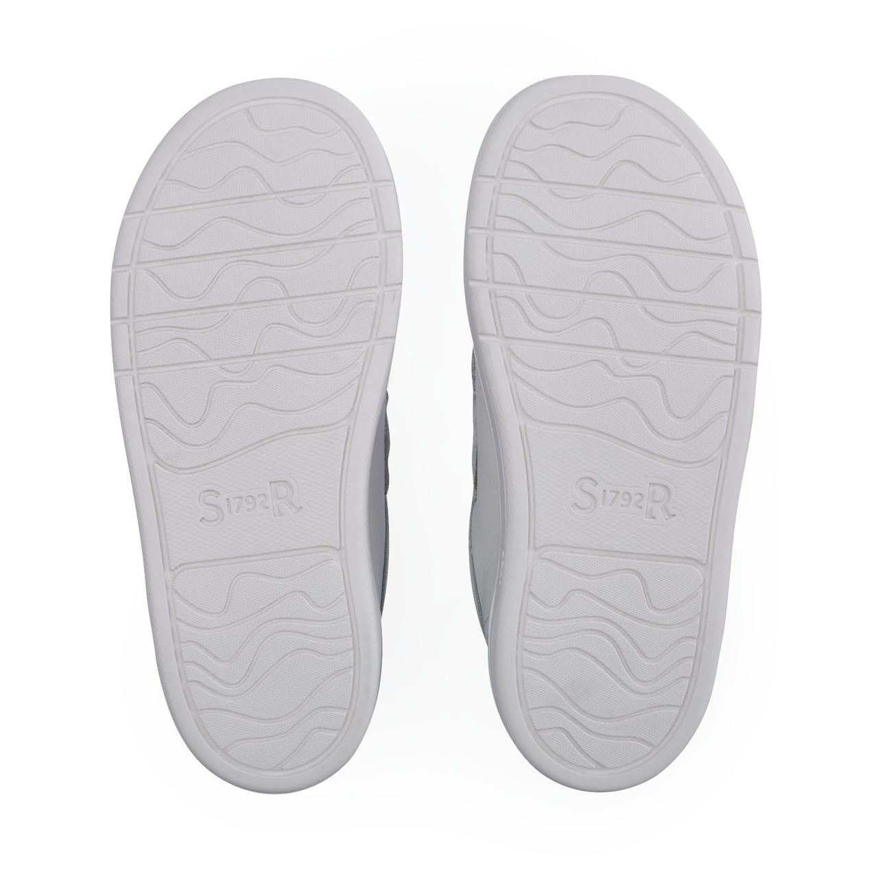 A pair of boys casual shoes by Start Rite, style Explore, in white and navy leather with double velcro fastening. Sole view.