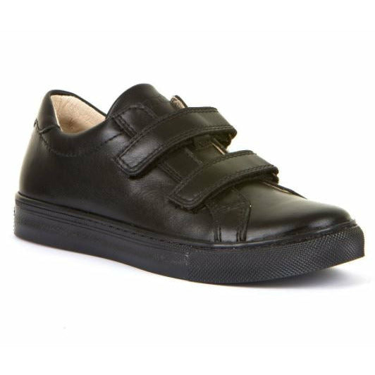 A boys casual school shoe by Froddo, style Morgan D, in black with double velcro fastening. Angled view.