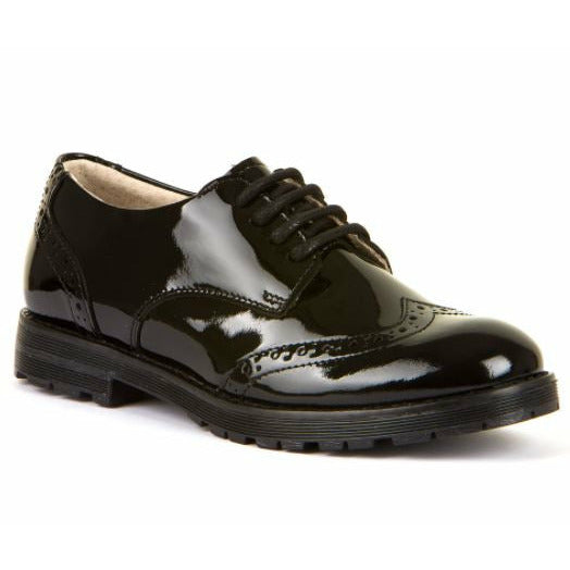 A girls school shoe by Froddo, style Charlie, in black patent with lace up fastening. Angled view.