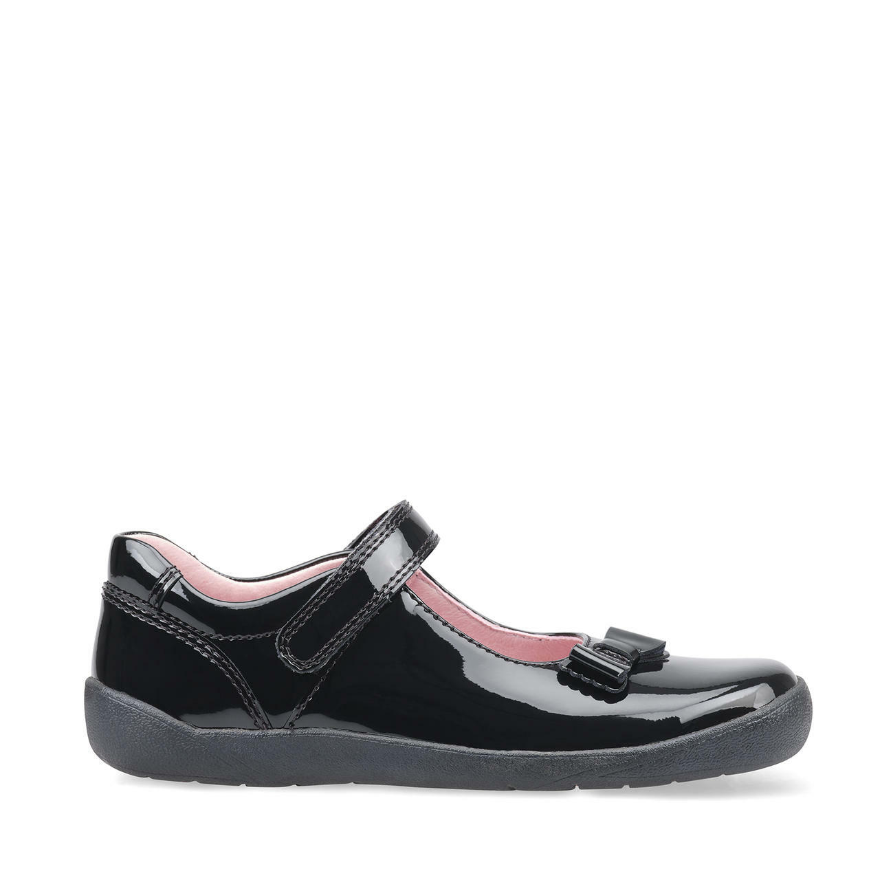 A girls Mary Jane school shoe by Start Rite, style Giggle, in black patent with velcro fastening. Right side view.