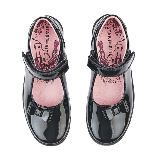 A pair of girls Mary Jane school shoes by Start Rite, style Giggle, in black patent with velcro fastening. Above view.