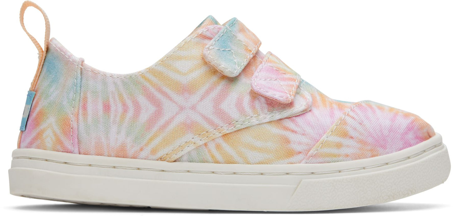 A girls canvas shoe by TOMS, style Cordones Cupsole, in Candy Pink Tie Dye with double velcro strap. Right side view.