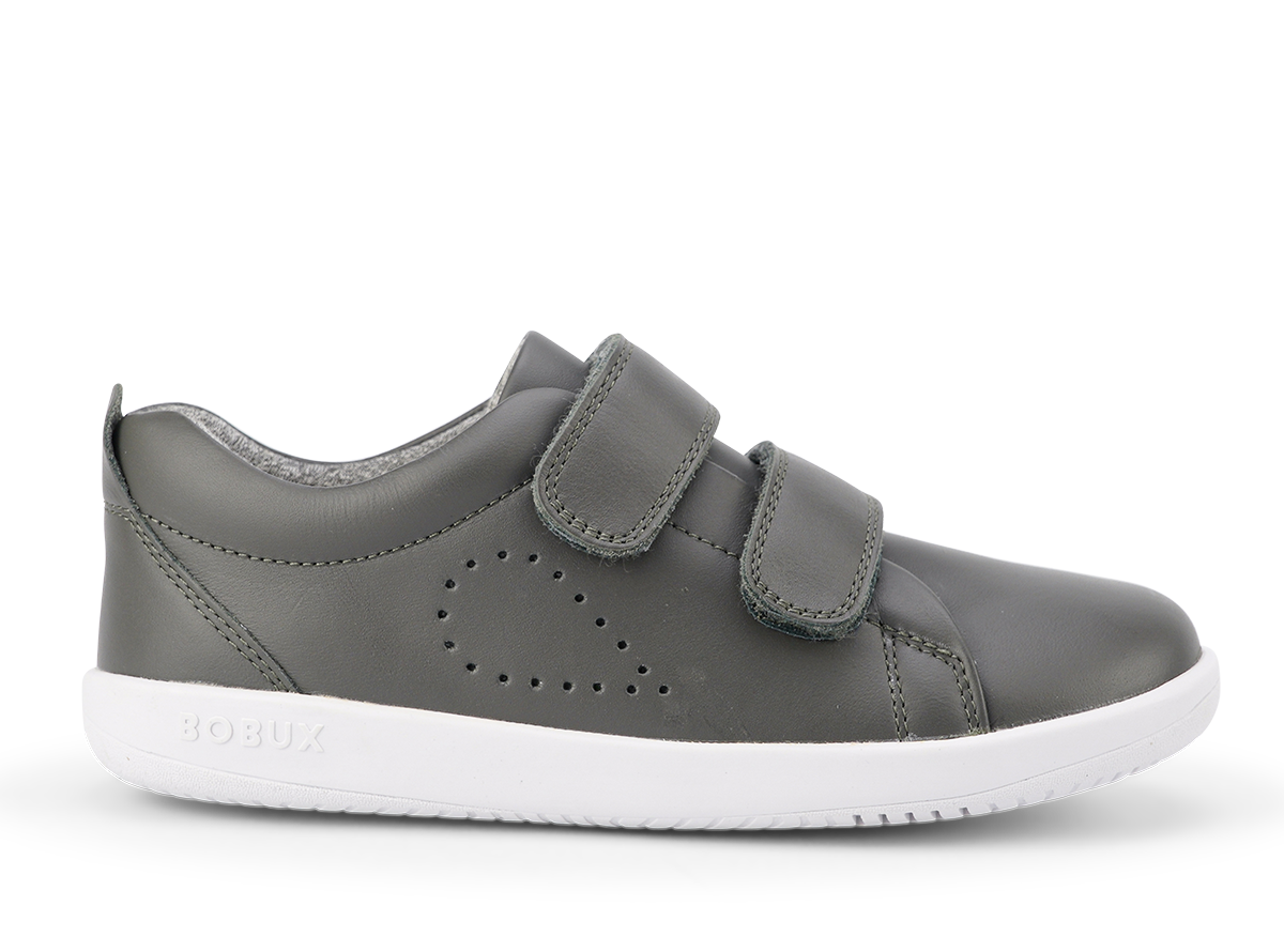 A boys casual trainer by Bobux, style Grass Court,in Grey with double velcro fastening. Right side view.