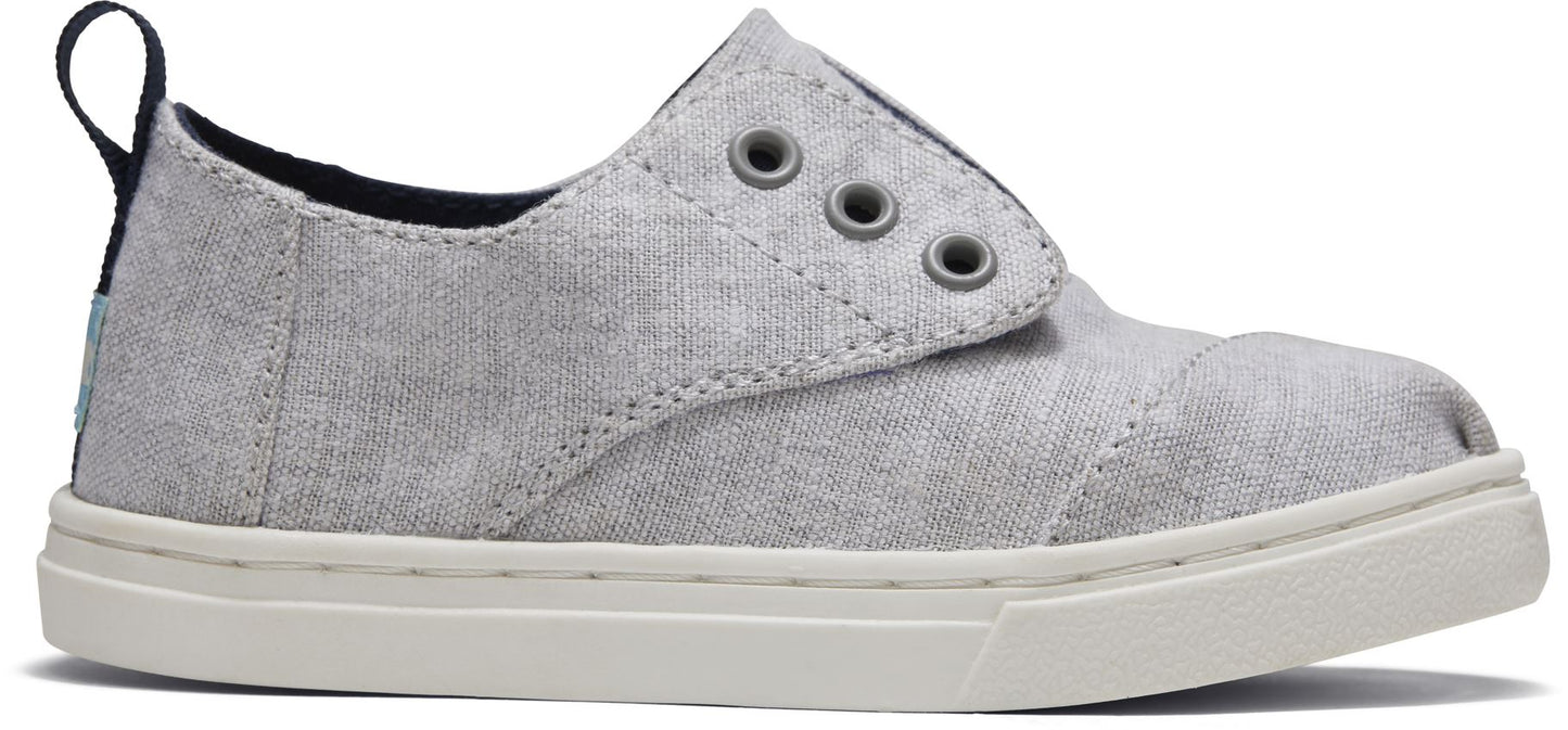 A unisex canvas shoe by TOMS, style Cordones Cupsole , in grey with hidden velcro tabs. Right side view.