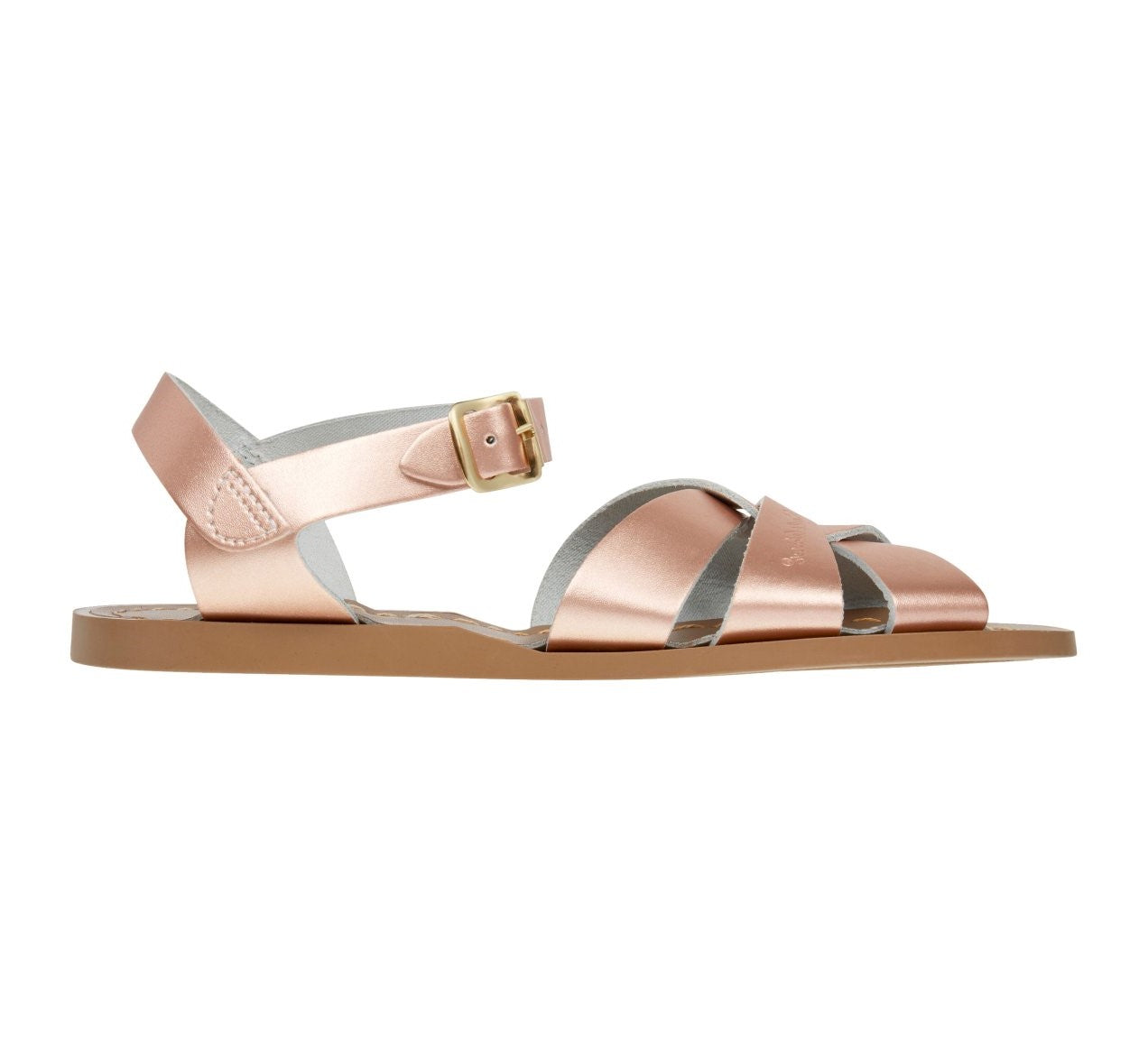 An original girls sandal by Salt Water Sandals in rose gold with single buckle fastening around the ankle. Open Toe and Sling-back with woven detail on the front. Right side view.
