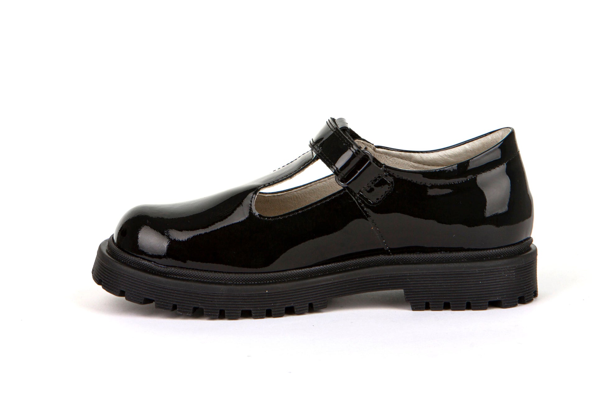 A girls T-Bar school shoe by Froddo, style Lea T, in black patent with velcro fastening. Inner side view.