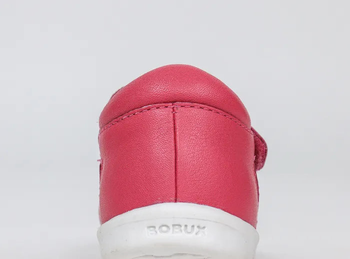 A girls closed toe sandal by Bobux,style Tropicana, in bright pink with double velcro fastening.in bright pink back view.