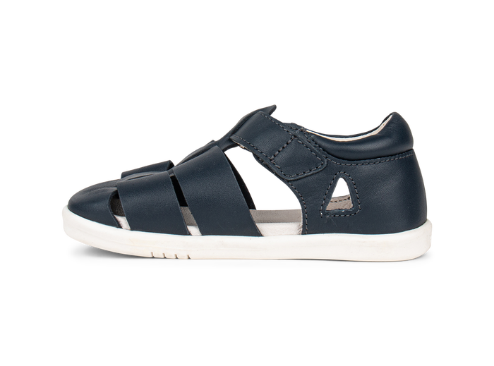 A boys closed toe sandal by Bobux,style Tidal in Navy with velcro fastening. Inner side view.