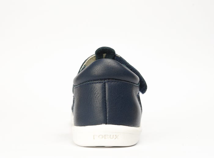 A boys closed toe sandal by Bobux,style Tidal, in Navy with velcro fastening. Back view.