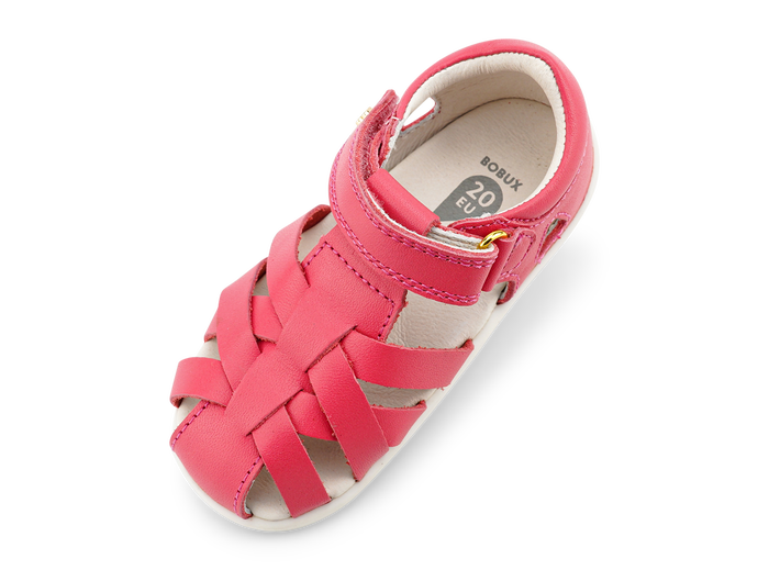 A girls closed toe sandal by Bobux, style Tropicana 2 in bright pink with velcro fastening. Above view.