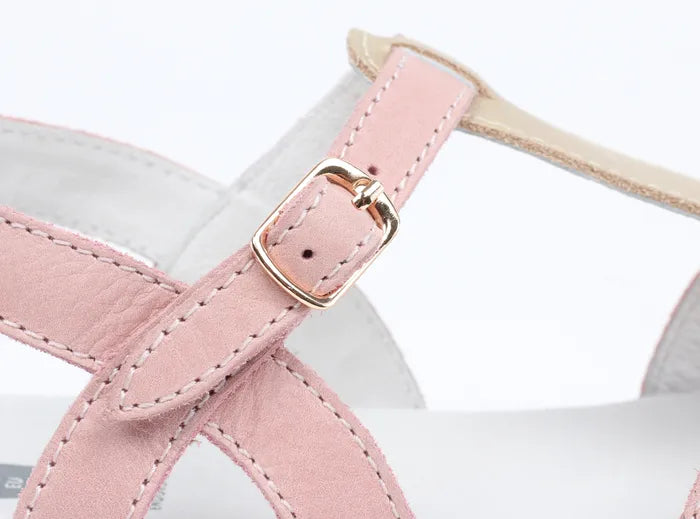 A girls open toe sandal by Bobux, style Pixie, in pink and gold with buckle fastening. Close up view.