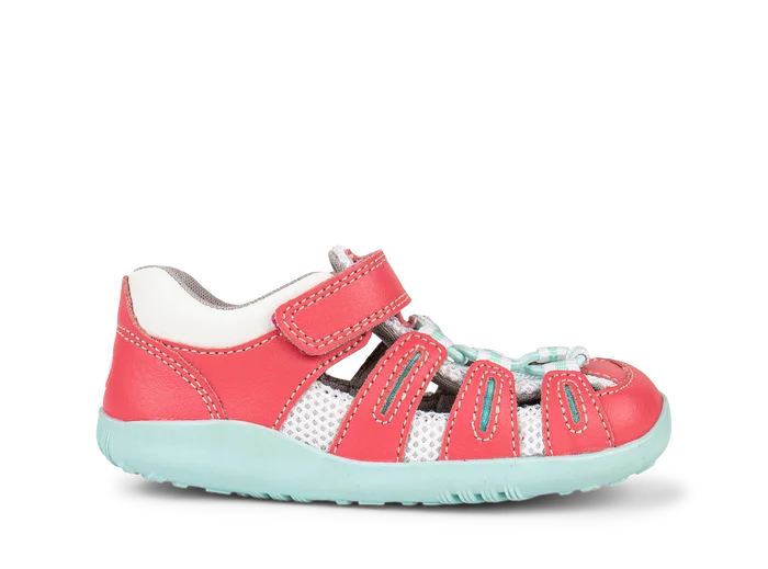 A girls closed toe sandal by Bobux, style Summit,in pink leather/microfibre with pale blue sole and trim and velcro/elastic fastening. Right side view.