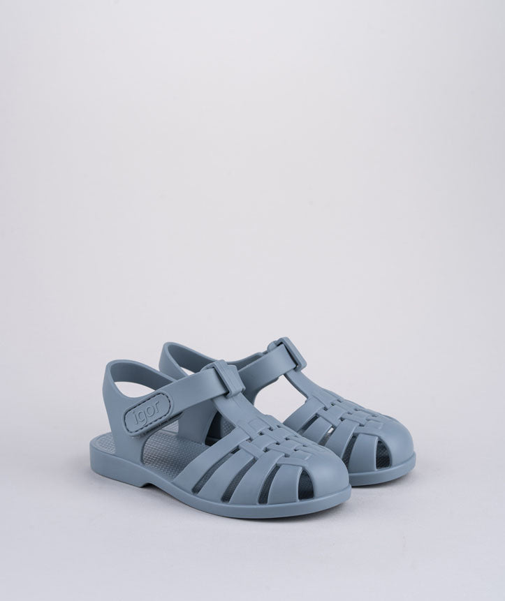 A pair of unisex closed toe sandals by Igor,style Clasica, in blue with velcro fastening. Right side view.