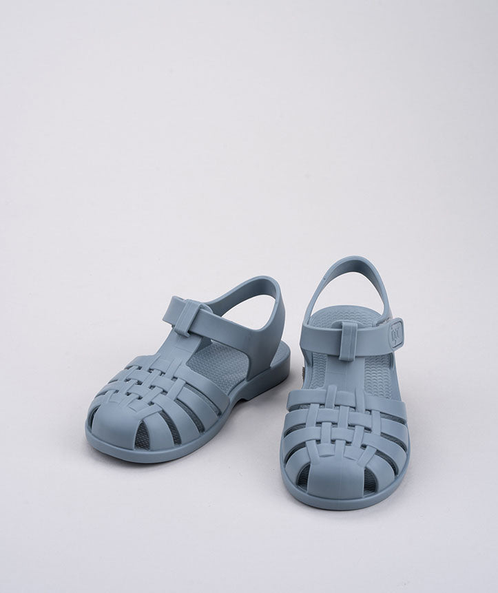 A pair of unisex closed toe sandals by Igor,style Clasica, in blue with velcro fastening. Front view.