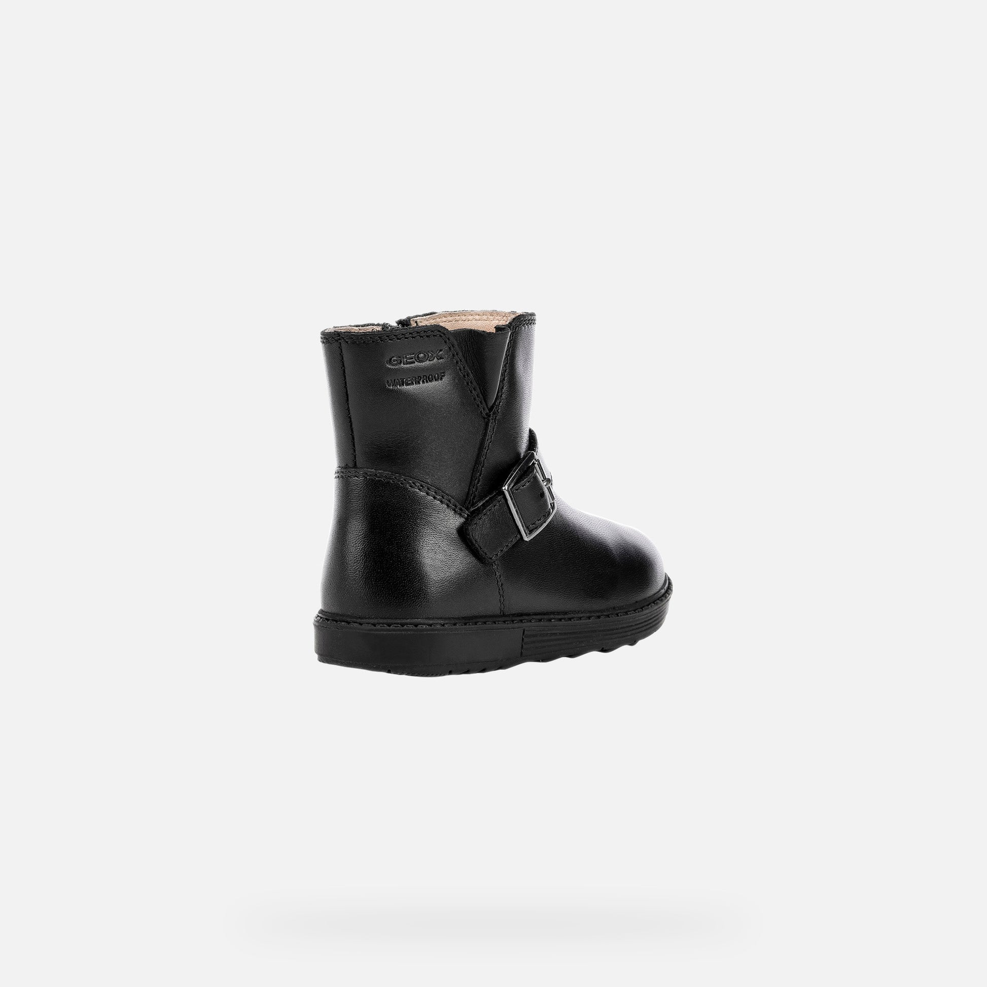 A girls waterproof ankle boot by Geox, style is Hynde in Black leather with zip side fastening and buckle across the top to alter width. Back view.