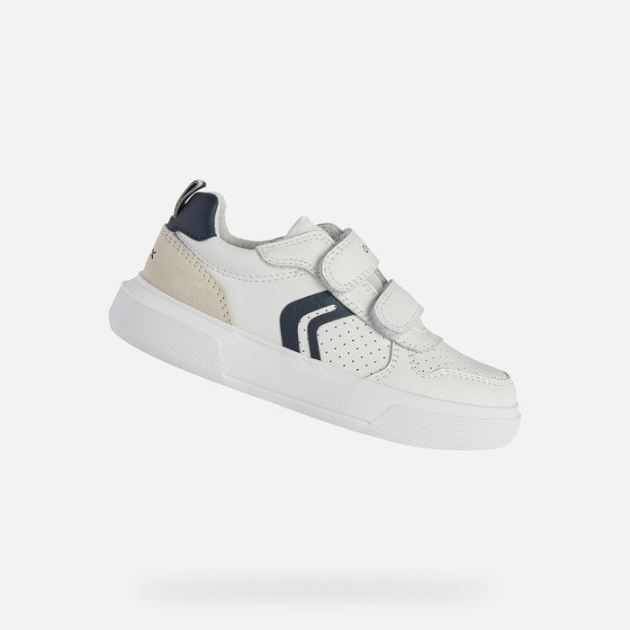 A casual boys trainer by Geox, style Nettuno, in white and navy with double velcro fastening. Right side view.