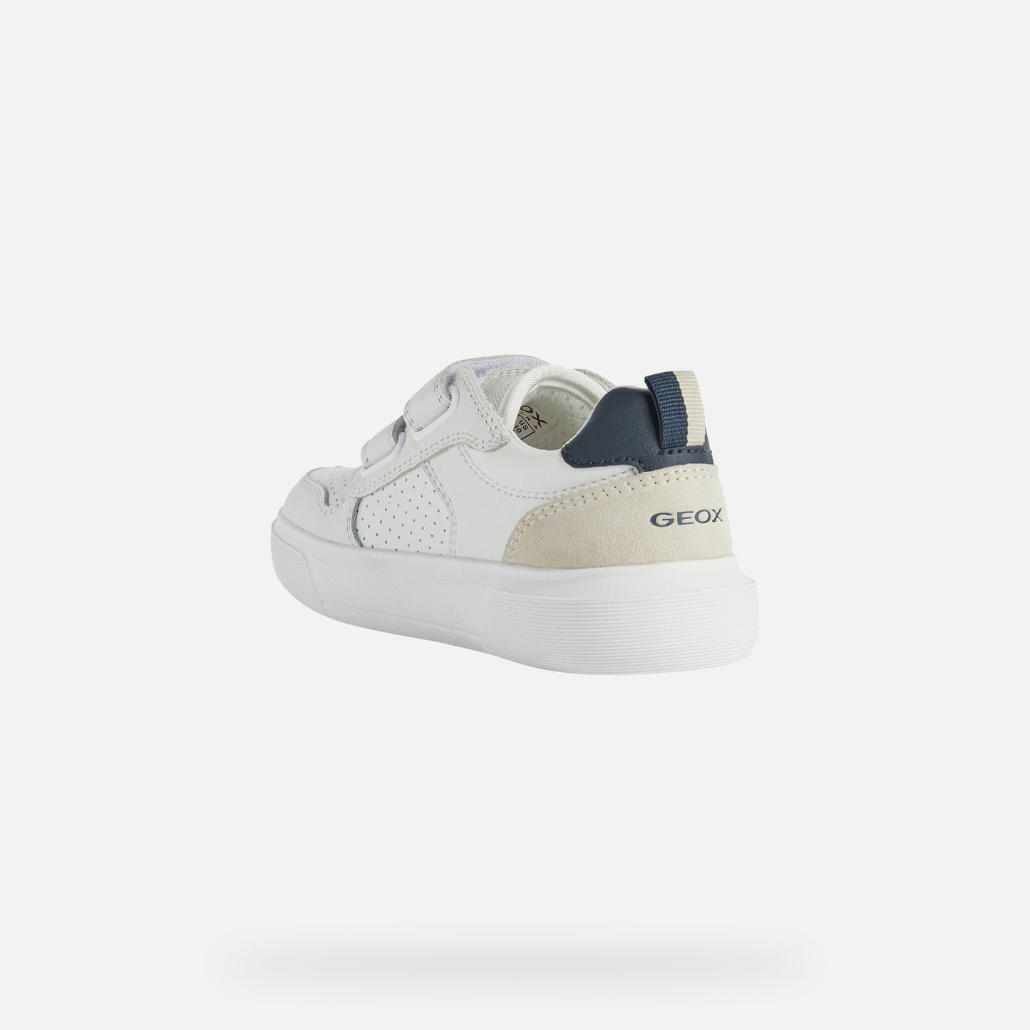 A casual boys trainer by Geox, style Nettuno, in white and navy with double velcro fastening. Back view.