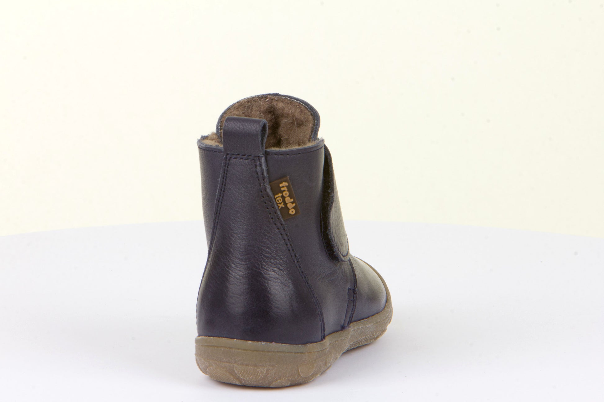 A unisex waterproof boot by Froddo, style Kart Tex Boot G2160071 in Navy. Back view.