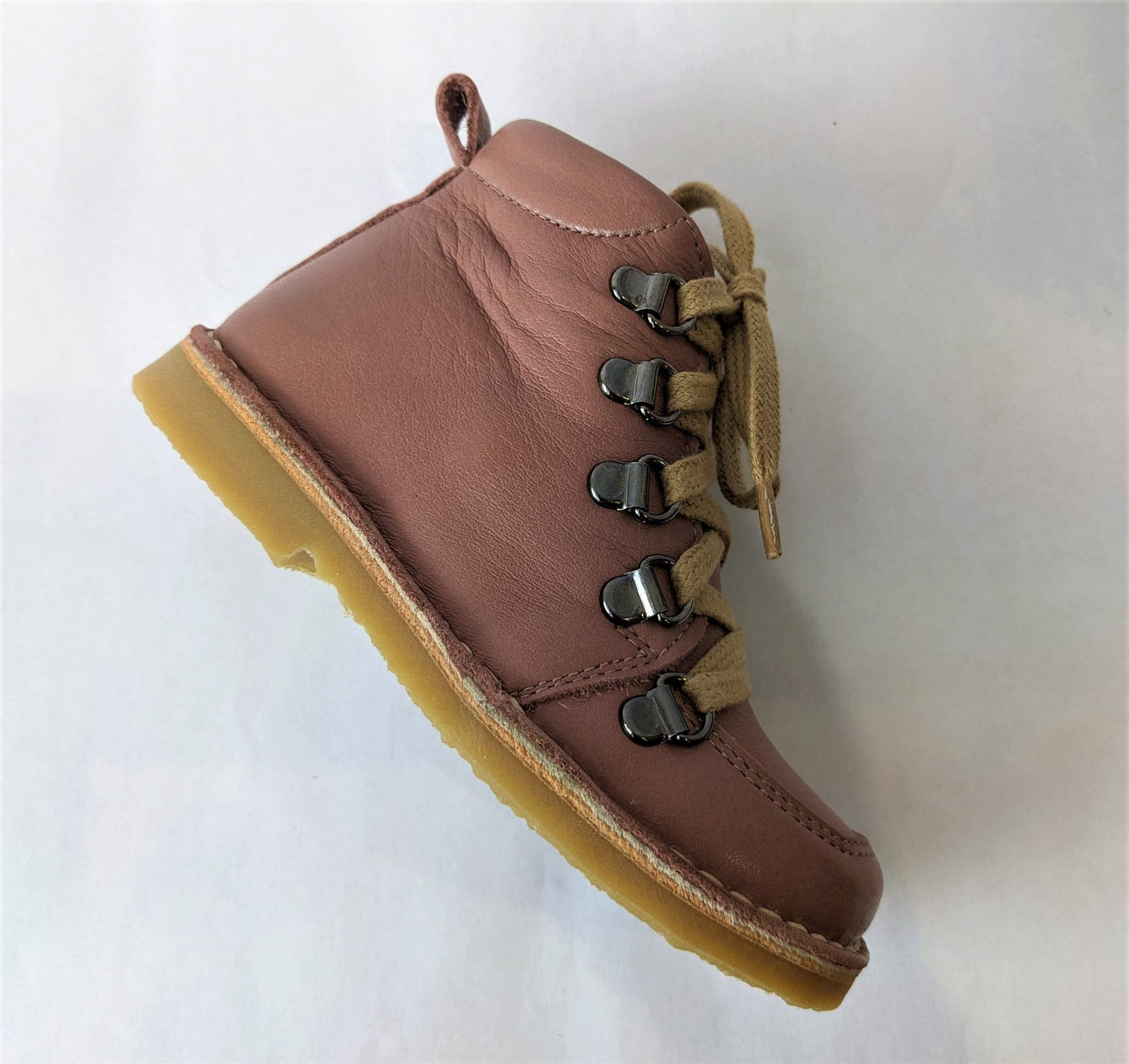 A girls lace up  boot by Petasil, style Kent, in pink leather with lace and zip fastening. Right side view.