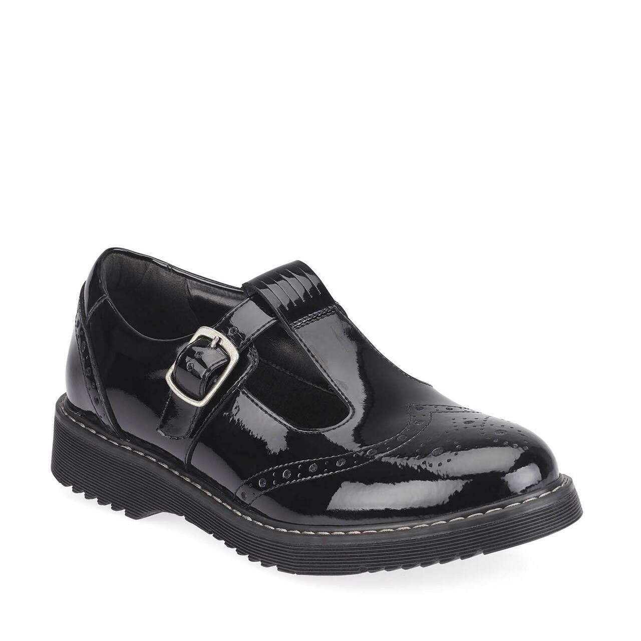 A girls T-Bar school shoe by Start Rite,style Imagine, in black patent with buckle fastening. Angled view.