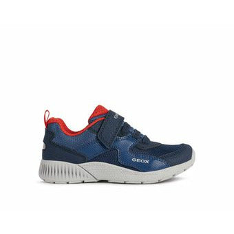 A boys casual trainer by Geox, style Sveth, in blue and red with velcro fastening. Right side view.